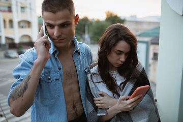 Image showing Quarantine lockdown, stay home concept - young beautiful caucasian couple enjoying new lifestyle during coronavirus worldwide health emergency