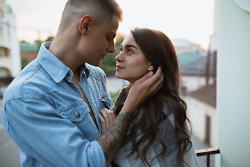 Image showing Quarantine lockdown, stay home concept - young beautiful caucasian couple enjoying new lifestyle during coronavirus worldwide health emergency