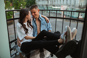 Image showing Quarantine lockdown, stay home concept - young beautiful caucasian couple enjoying new lifestyle during coronavirus worldwide health emergency