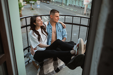 Image showing Quarantine lockdown, stay home concept - young beautiful caucasian couple enjoying new lifestyle during coronavirus worldwide health emergency