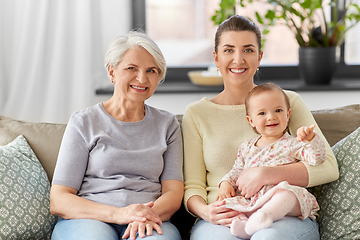 Image showing mother, daughter and grandmother on sofa at home