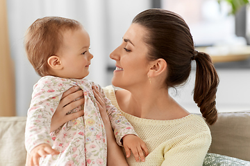 Image showing happy mother with little baby daughter at home