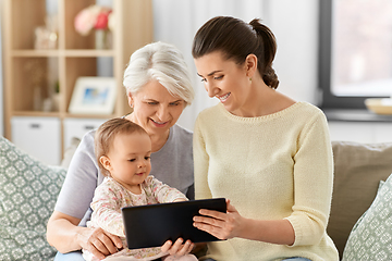 Image showing mother, daughter and grandma with tablet pc