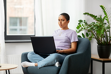 Image showing african american woman with laptop at home