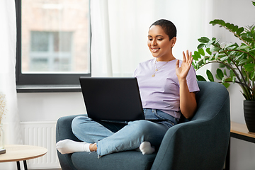 Image showing african woman with laptop having video call