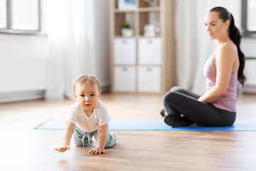 Image showing happy mother with little baby at home