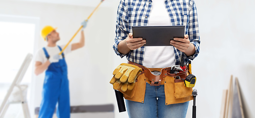 Image showing woman or builder with tablet pc and working tools