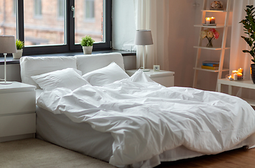 Image showing cozy bedroom with white linen on bed