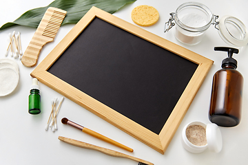 Image showing natural cosmetics and chalkboard