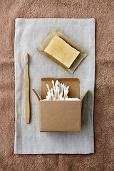 Image showing wooden toothbrush, handmade soap cotton swabs