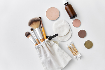 Image showing make up brushes, cosmetics and cotton swabs