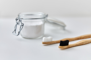 Image showing washing soda and wooden toothbrushes