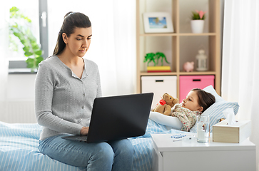 Image showing ill daughter and mother with laptop at home