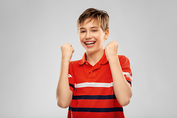 Image showing portrait of happy smiling boy celebrating success