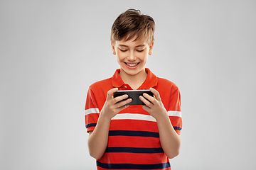 Image showing portrait of happy smiling boy with smartphone