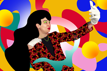 Image showing Portrait of a young woman with freaky appearance, look and bright colorful painted design