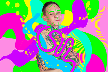 Image showing Portrait of a young man with freaky appearance, look and bright colorful painted design