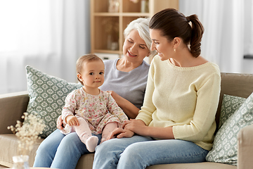 Image showing mother, daughter and grandmother on sofa at home