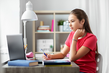 Image showing student girl with laptop computer learning at home