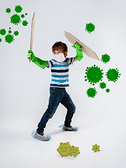 Image showing Little caucasian boy as a warrior in fight with coronavirus pandemic, bright design with cute and funny cartoons style drawings