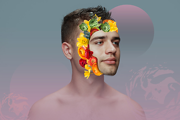 Image showing Portrait of beautiful young man with modern floral design, inspiration artwork. Fashion, beauty, summer concept.