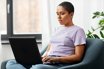 Image showing african american woman with laptop at home