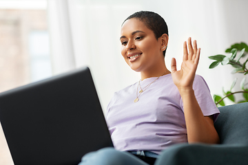 Image showing african woman with laptop having video call