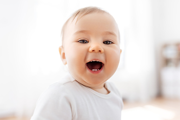 Image showing portrait of happy laughing little baby at home