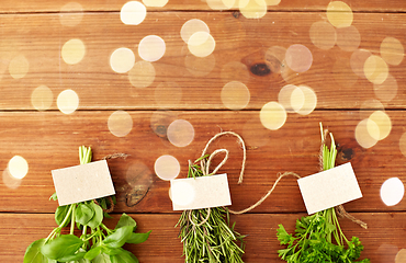 Image showing greens, spices or medicinal herbs on wooden boards