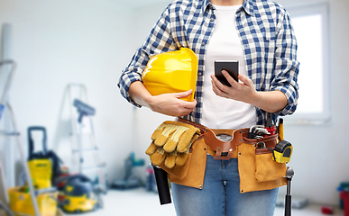 Image showing woman or builder with phone and working tools