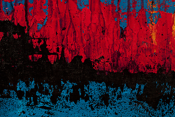 Image showing Blue, red and black colored wall texture background.