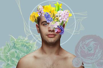 Image showing Portrait of beautiful young man with modern floral design, inspiration artwork. Fashion, beauty, summer concept.