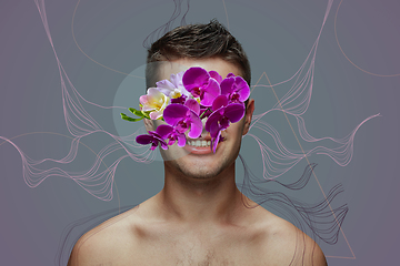 Image showing Portrait of beautiful young man with modern floral design, inspiration artwork. Fashion, beauty, summer concept.