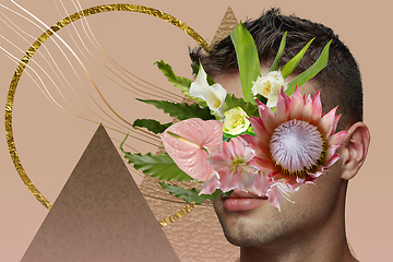 Image showing Portrait of beautiful young man with modern floral design, inspiration artwork. Fashion, beauty, summer concept.