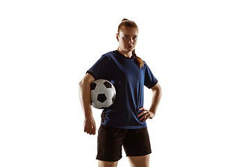 Image showing Female soccer, football player posing confident with ball isolated on white background