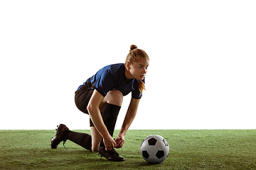 Image showing Female soccer, football player preparing for game isolated on white background