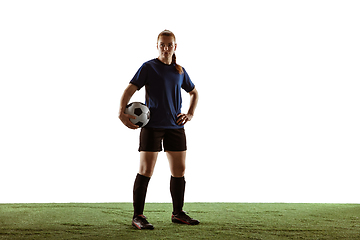 Image showing Female soccer, football player posing confident with ball isolated on white background