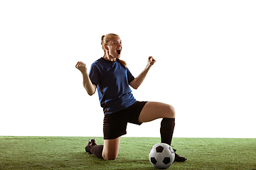 Image showing Female soccer, football player celebrating goal winning with bright expressive emotions isolated on white background
