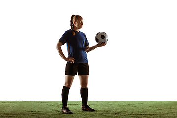 Image showing Female soccer, football player posing confident with ball isolated on white background