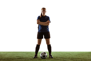 Image showing Female soccer, football player posing confident with ball isolated on white background