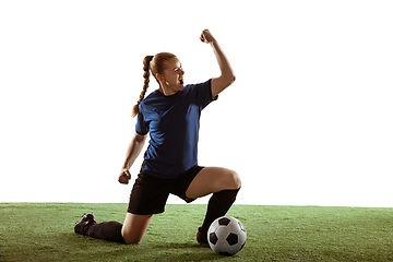 Image showing Female soccer, football player celebrating goal winning with bright expressive emotions isolated on white background