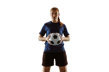 Image showing Female soccer, football player posing confident with ball isolated on white background