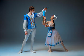 Image showing Young and graceful ballet dancers as Cinderella fairytail characters.