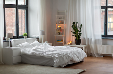 Image showing cozy bedroom with white linen on bed