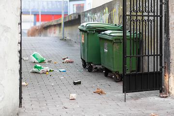 Image showing dumpsters on messy city street or courtyard