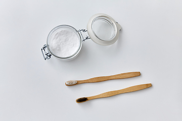 Image showing washing soda and wooden toothbrushes