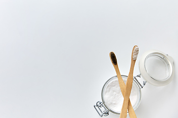 Image showing washing soda and wooden toothbrushes