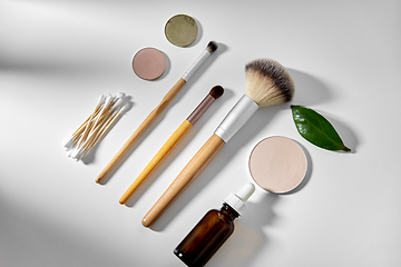 Image showing make up brushes, cosmetics and cotton swabs