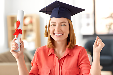 Image showing student woman with laptop and diploma at home