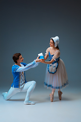 Image showing Young and graceful ballet dancers as Cinderella fairytail characters.